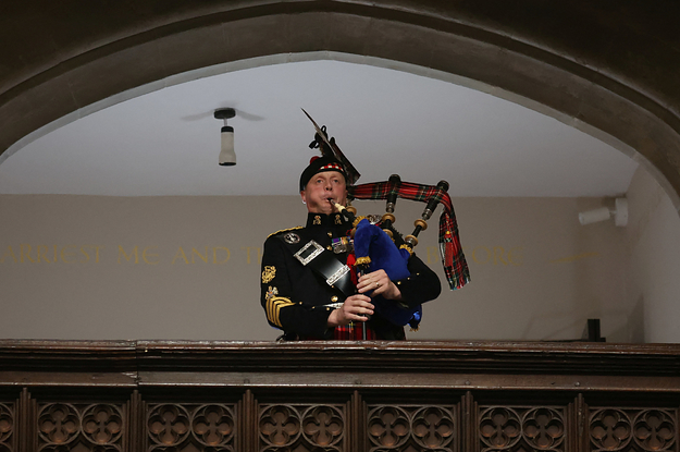 Queen's Piper Plays Bagpipes At Funeral