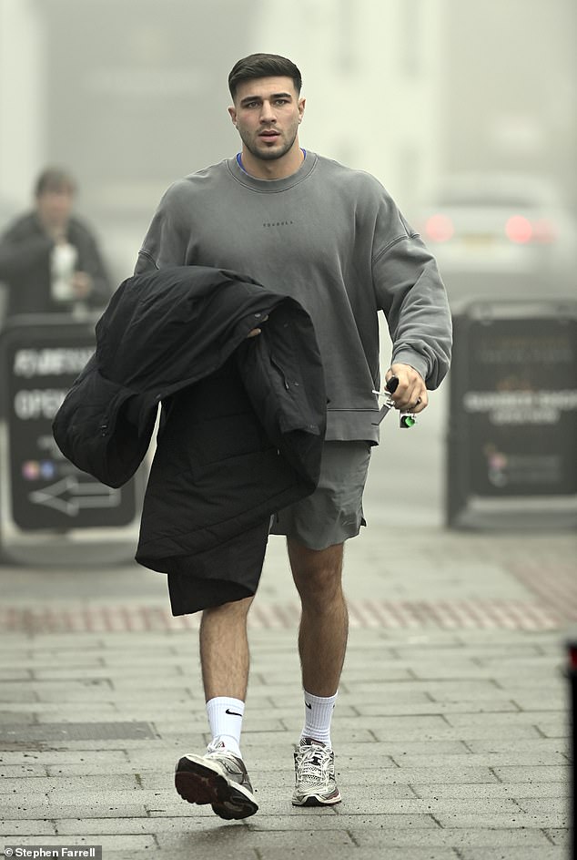 Tommy Fury cut a casual figure as he left Fade Masters Hair Salon in Hale, Manchester on Friday