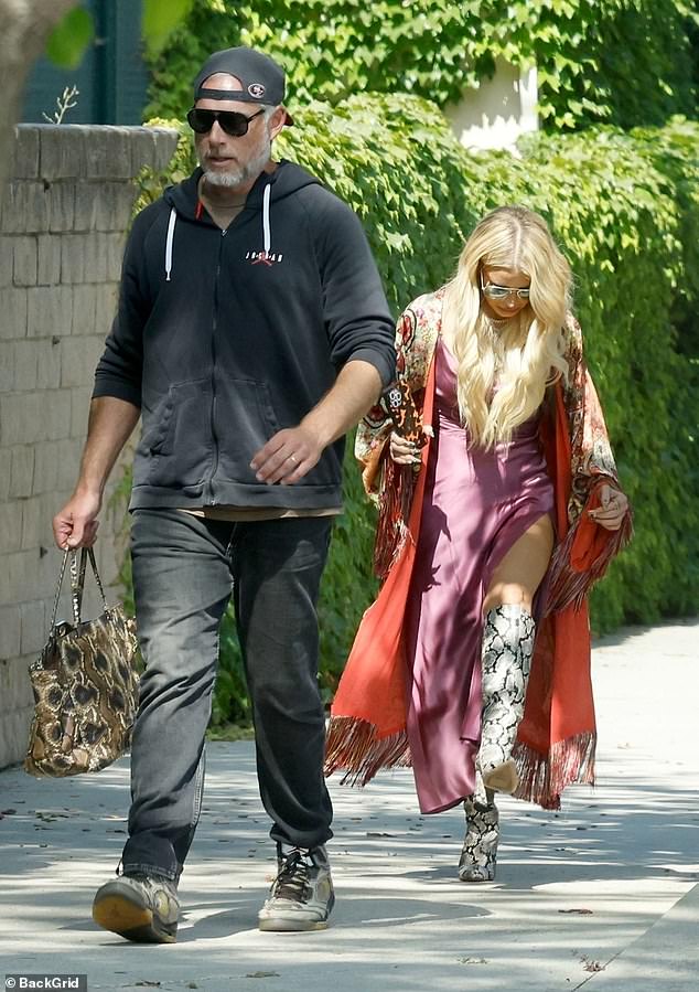 Amid Jessica Simpson's announcement that her 10-year marriage to Eric Johnson is ending , Dailymail.com is taking a closer look at the warning signs that the couple exhibited over their final years of their marital union. They appeared to be distant in a photo snapped last June