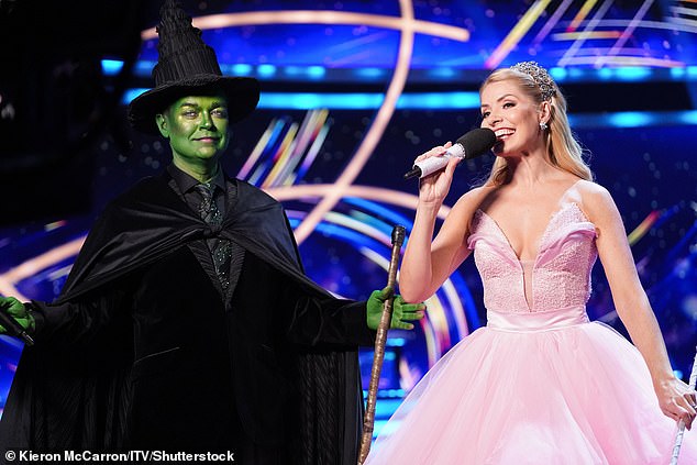 Holly Willoughby puts on a busty display in pink ballgown while Stephen Mulhern is covered in green face paint for Wicked-inspired transformation in Dancing On Ice's Movie Week