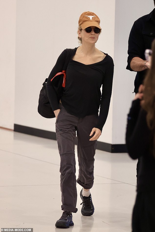 Renee Zellweger, 55, went incognito as she left Sydney Airport to jet back home on Tuesday, following her Bridget Jones: Mad About The Boy press run