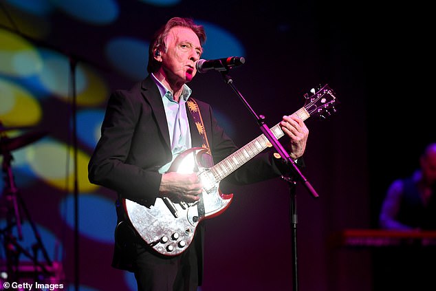 Legendary 70s guitarist Joey Molland has died at the age of 77. The news of the Badfinger musican's death was confirmed in a statement on the band's Facebook page on Sunday (pictured in 2019)