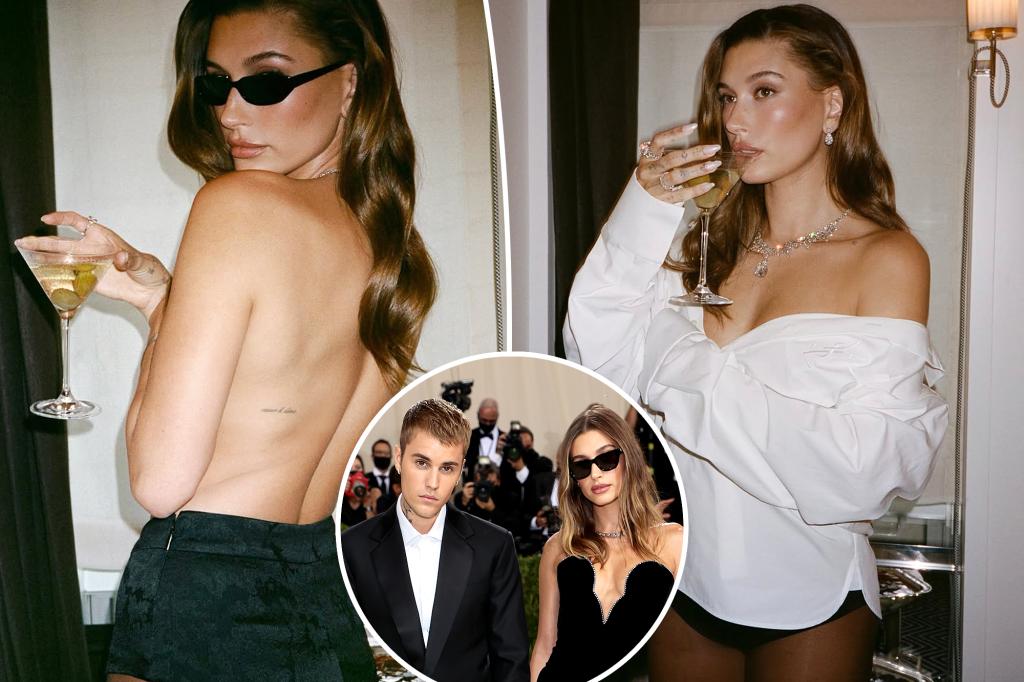 Hailey Bieber ditches top for intimate photo shoot