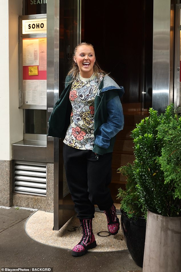 JoJo Siwa, 21, couldn't wipe the smile off her face as she stepped out in Soho, New York ahead of her return to the UK at the end of the month