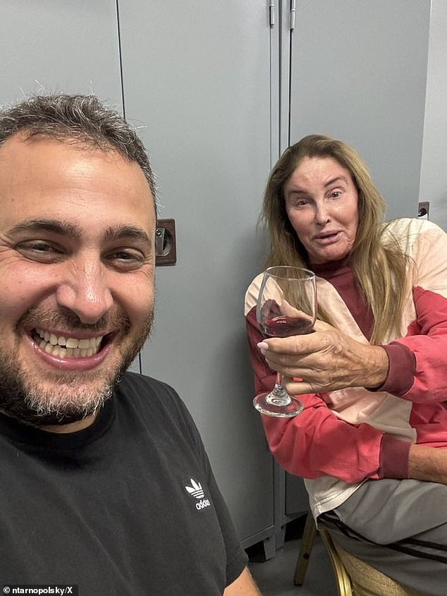 Caitlyn Jenner was drinking wine and texting members of her family while bombs rained down near her Tel Aviv hotel on Friday night, the Daily Mail can reveal