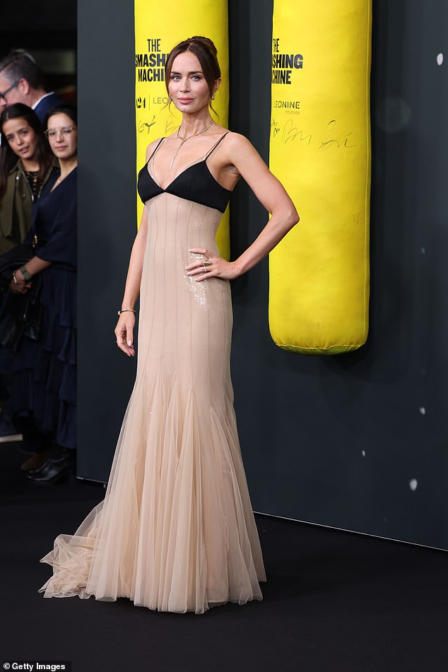 Emily Blunt, 42, looked nothing short than ethereal in a nude gown as she attended the premiere of The Smashing Machine in Berlin on Monday