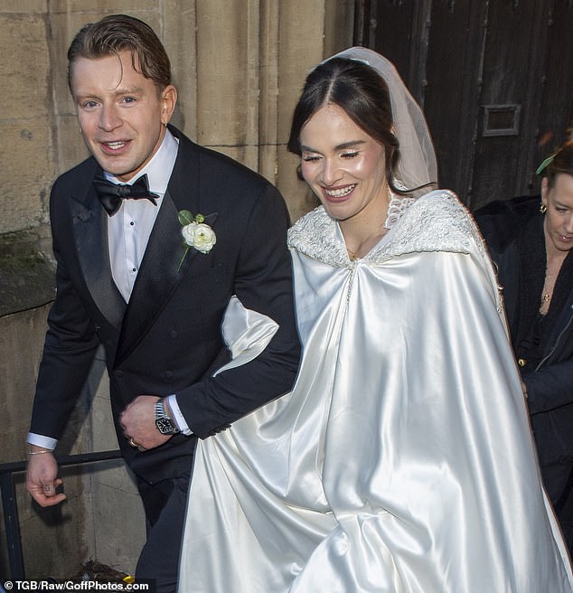 Holly Ramsay and husband Adam Peaty are seen leaving their wedding at Bath Abbey