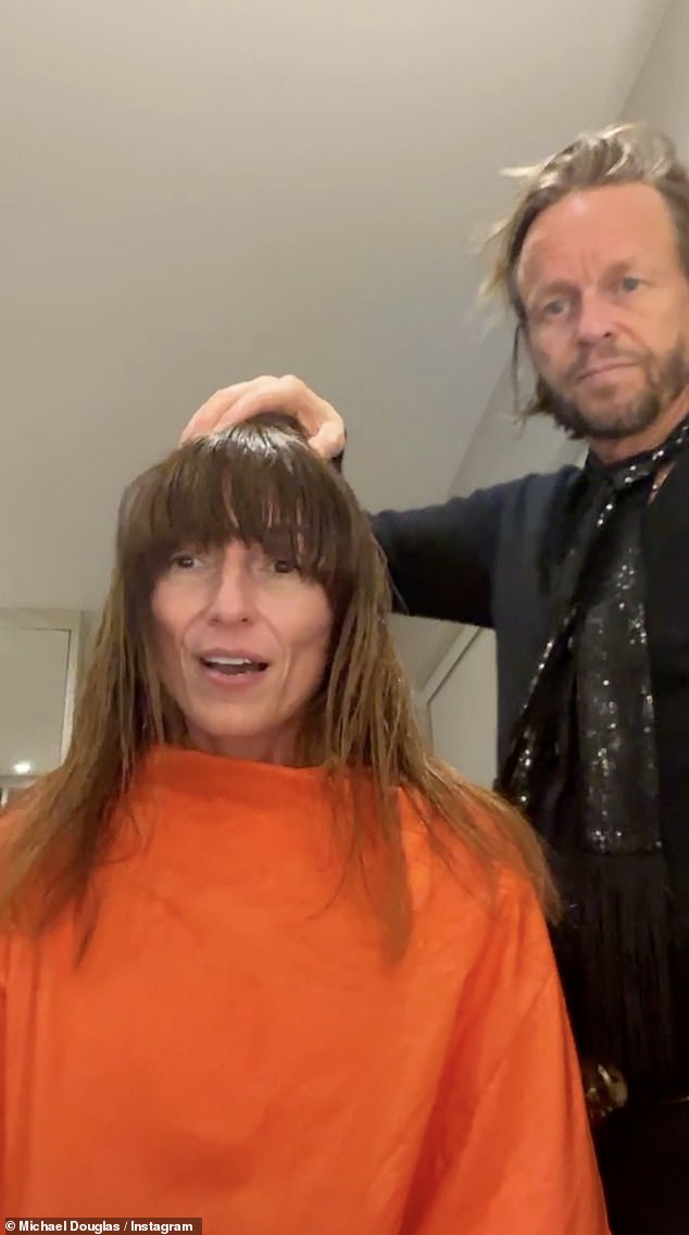 Davina McCall and her husband Michael Douglas have admitted they can't wait for 2025 to end after enduring a 'hell of a year' following the presenter's brain tumour and breast cancer diagnosis