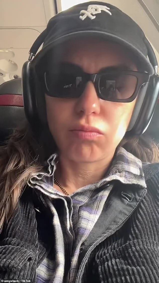 Amy Shark has been slammed after she appeared to 'baby shame' a mother during a flight in a TikTok video
