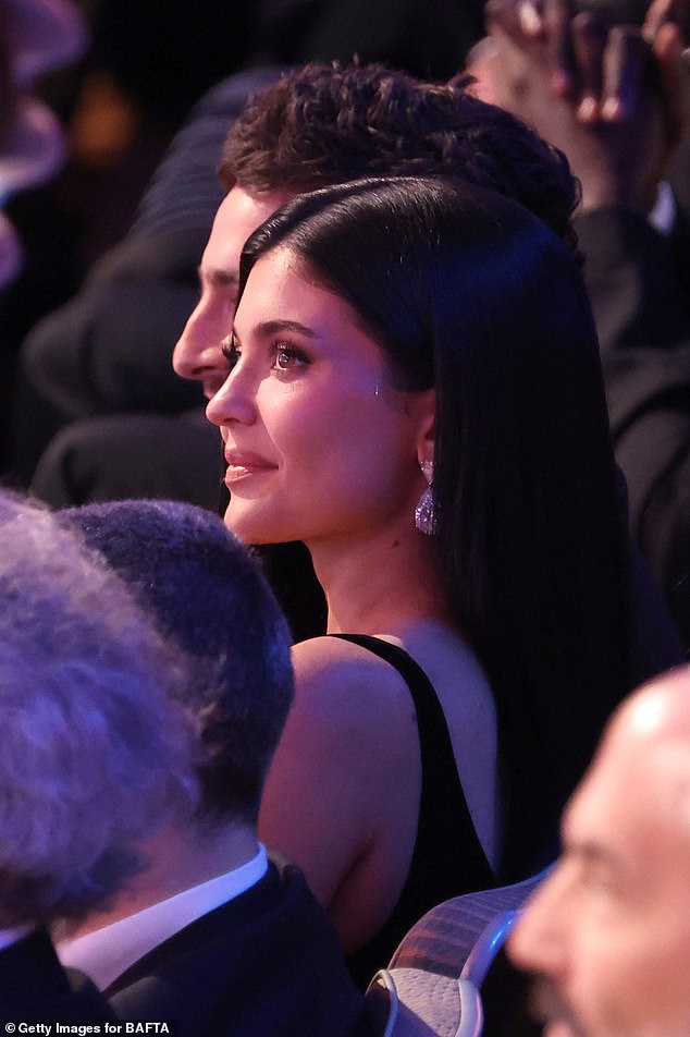 Kylie Jenner was left visibly squirming in the midst of an awkward joke made by Alan Cummings at Sunday night's BAFTAs