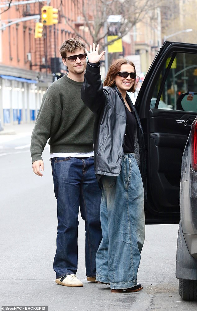 Millie Bobby Brown was seen flashing an awkward smile on her 22nd birthday with husband Jake Bongiovi in New York City Thursday