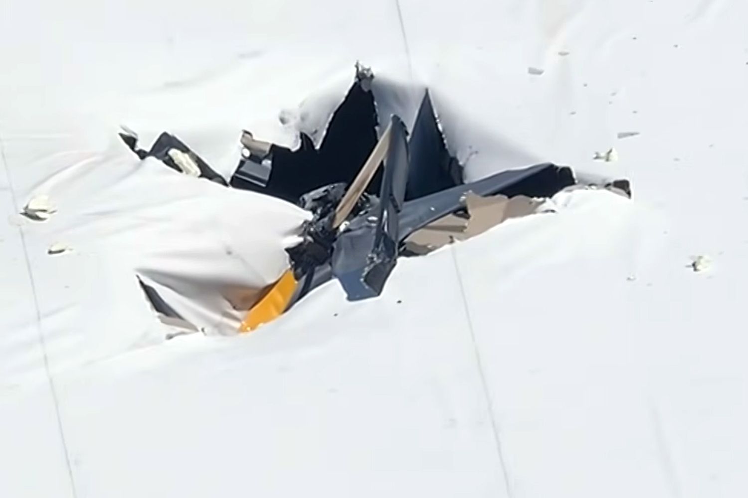 2 Dead After Helicopter Crashes into Florida Warehouse Roof