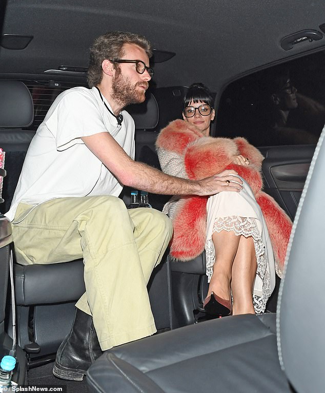 Lily Allen, 40, cosied up to her new boyfriend Jonah Freud, 28, in the back of a cab after she performed her show West End Girl at The London Palladium on Friday