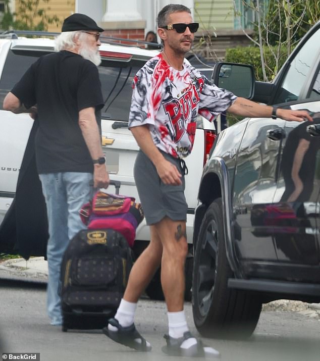 Shia LaBeouf and his father Jeffrey were glimpsed in Rome this week for the latter's baptism - after the former child star was cleared to travel amid his pending charges