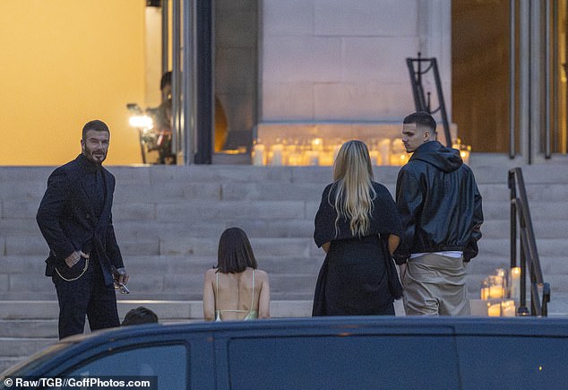 Victoria Beckham is supported by husband David and children Romeo, Cruz and Harper at her Paris Fashion Week show – but estranged son Brooklyn continues to isolate himself from family festivities