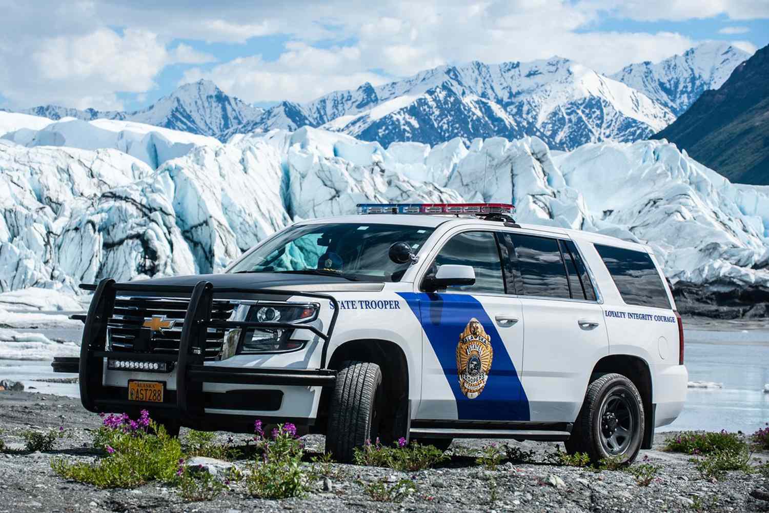 A photo of an Alaska State Trooper vehicle near an icy lake.Credit: Alaska State Trooper/Facebook