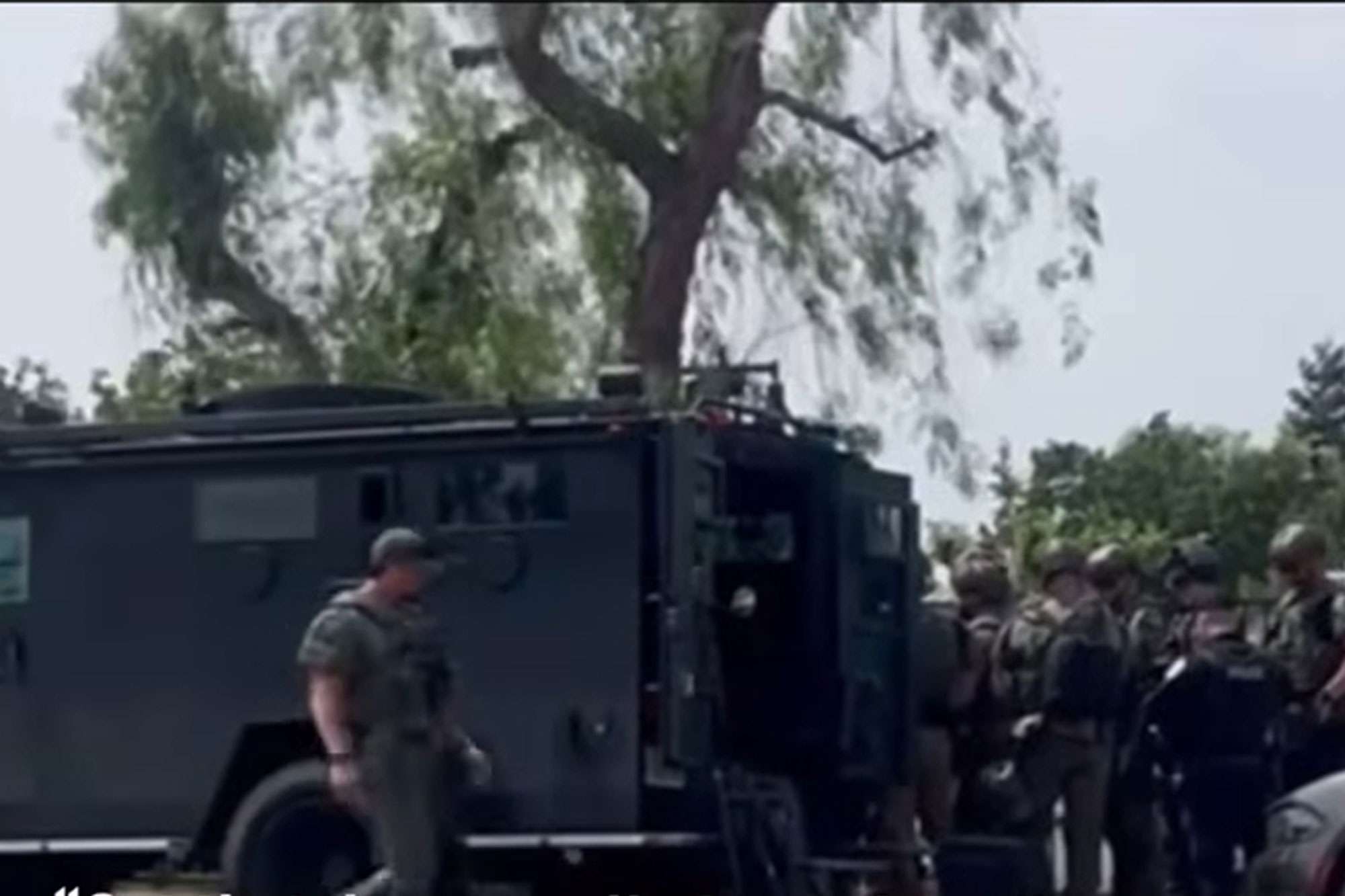 A SWAT vehicle is seen in Porterville, Calif.Credit: KMPHFox26/Youtube