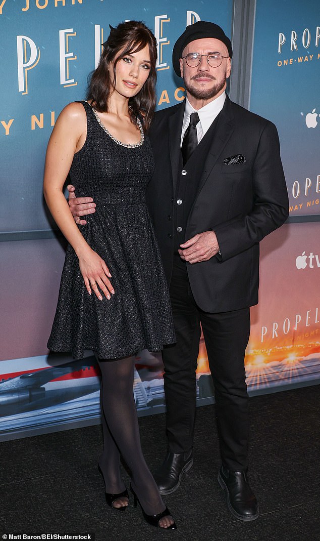 John Travolta continues to sport his kooky new look with another beret as he joins stunning daughter Ella Bleu, 26, at the LA premiere of his directorial debut