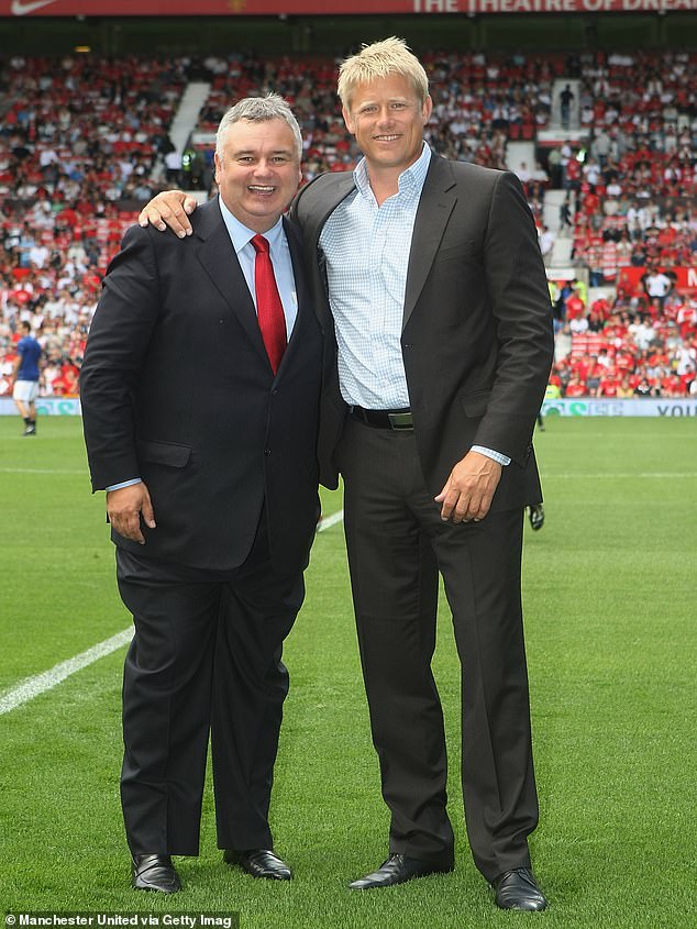 Eamonn Holmes poses with former footballer Peter Schmeichel ahead of the Ole Gunnar Solskjaer Testimonial match between Manchester United and RCD Espanyol at Old Trafford in 2008