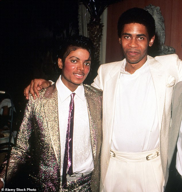 John McClain, a co-executor of Michael Jackson's $2.5 billion estate, died on Tuesday at the age of 71 in Malibu, California. Pictured in 1984 in LA with the late King of Pop