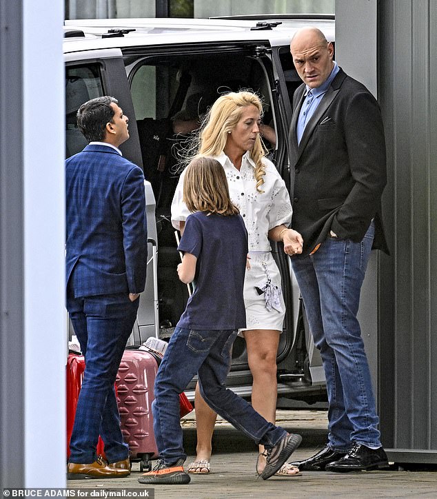 Paris and Tyson Fury looked stressed as they departed the Comis Hotel on Sunday following daughter Venezula's huge wedding to husband Noah Price