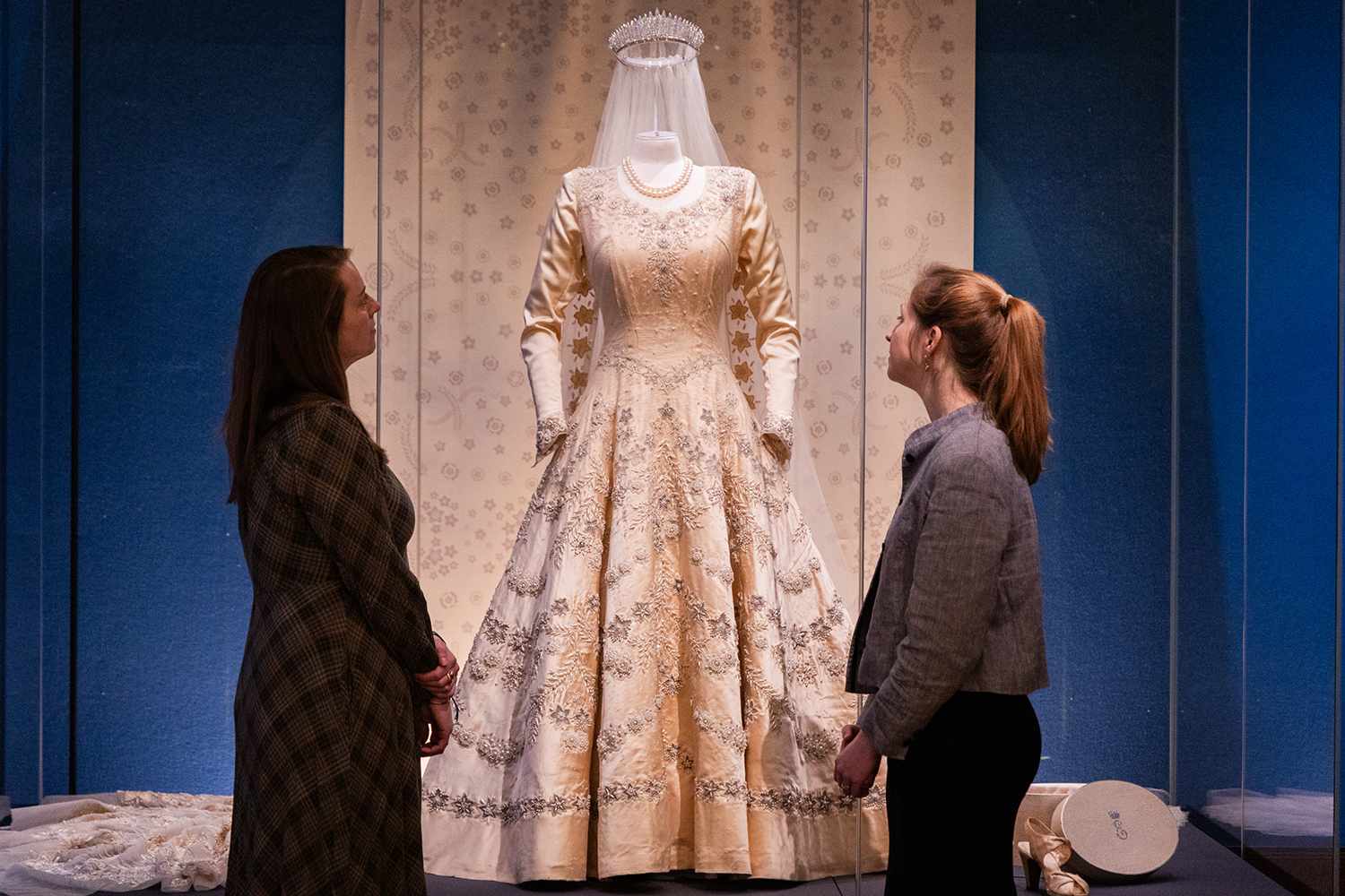 Queen Elizabeth's wedding dress on show at the exhibition in LondonCredit: Tristan Fewings/Getty