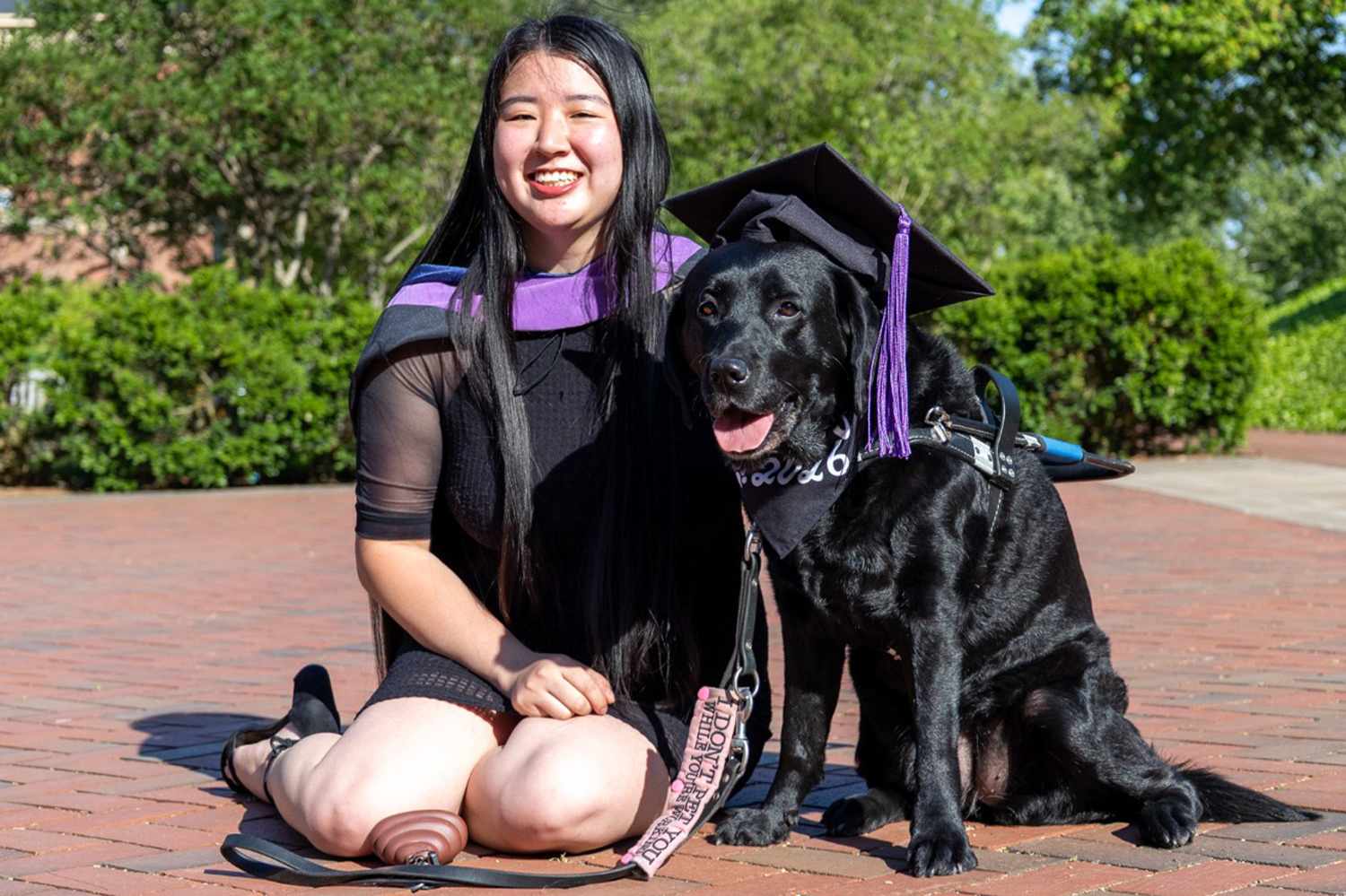 Nola Timmins and her guide dog, BrizzyCredit: Emma Hildebrand with @one_door_studio