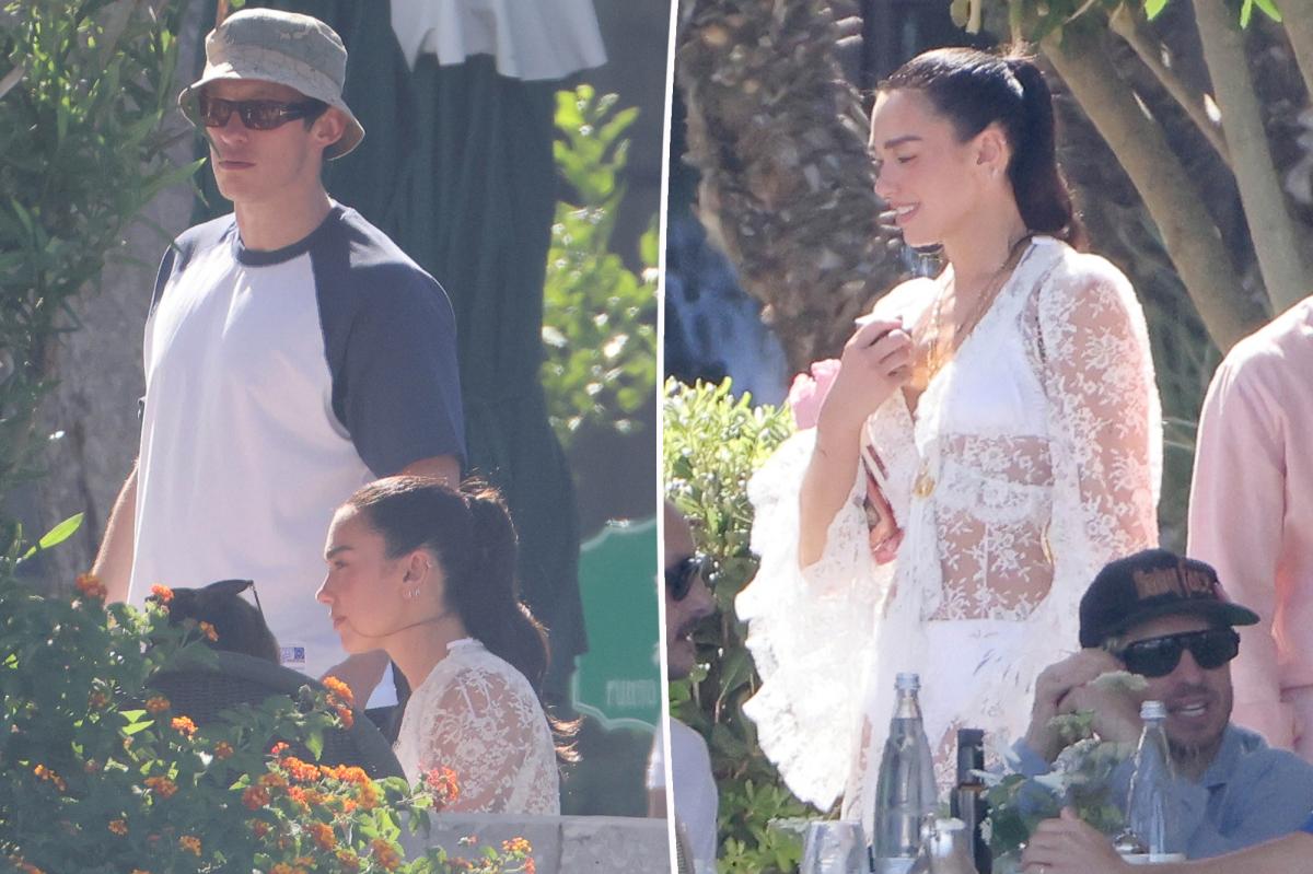 Dua Lipa radiates bridal vibes in white lace dress following wedding to Callum Turner
