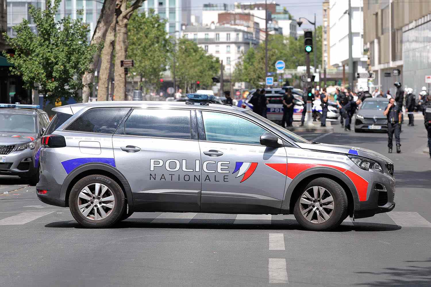 Police block a street in Paris after three women were stabbed on July 27, 2026Credit: Kenzo TRIBOUILLARD / AFP via Getty
