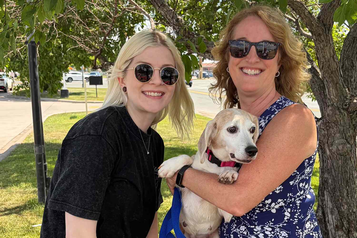 Stephanie Stern (left) with Marshmallow and the dog’s foster parentCredit: Stephanie Stern