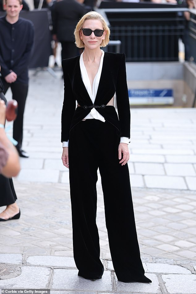 Cate Blanchett (pictured) and Rosamund Pike opted for matching chic looks as they attended the Giorgio Armani Show during Haute Couture Paris Fashion Week on Tuesday
