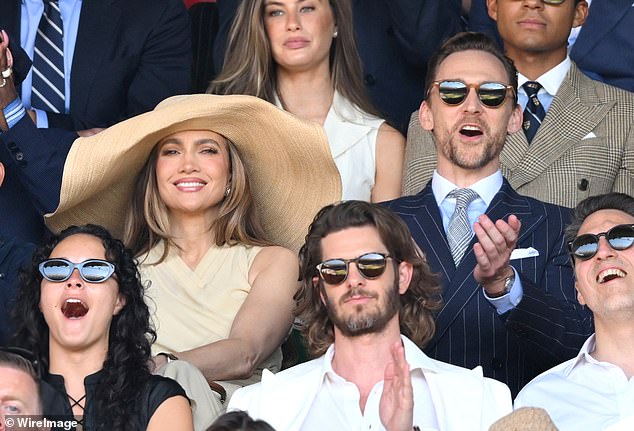 Jennifer Lopez has faced backlash as fans deemed her huge sun hat 'inappropriate' as she blocked the view in the Wimbledon stands after major fashion statement