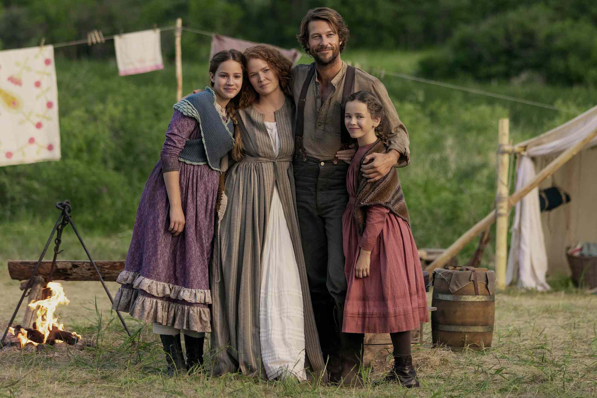 Skywalker Hughes as Mary Ingalls, Crosby Fitzgerald as Caroline Ingalls, Luke Bracey as Charles Ingalls and Alice Halsey as Laura Ingalls in episode 102 of ‘Little House on the Prairie’.Credit: Eric Zachanowich/Netflix