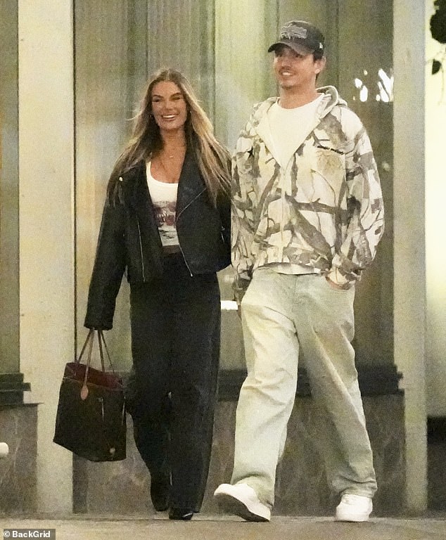 Skye Wheatley, 32, was all smiles on Monday as she appeared to be getting cosy with controversial comedian Julian Woods during an outing in Fortitude Valley